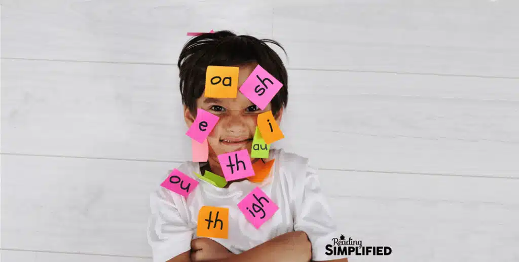 boy covered in sticky notes