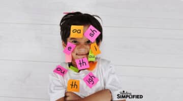 boy covered in sticky notes