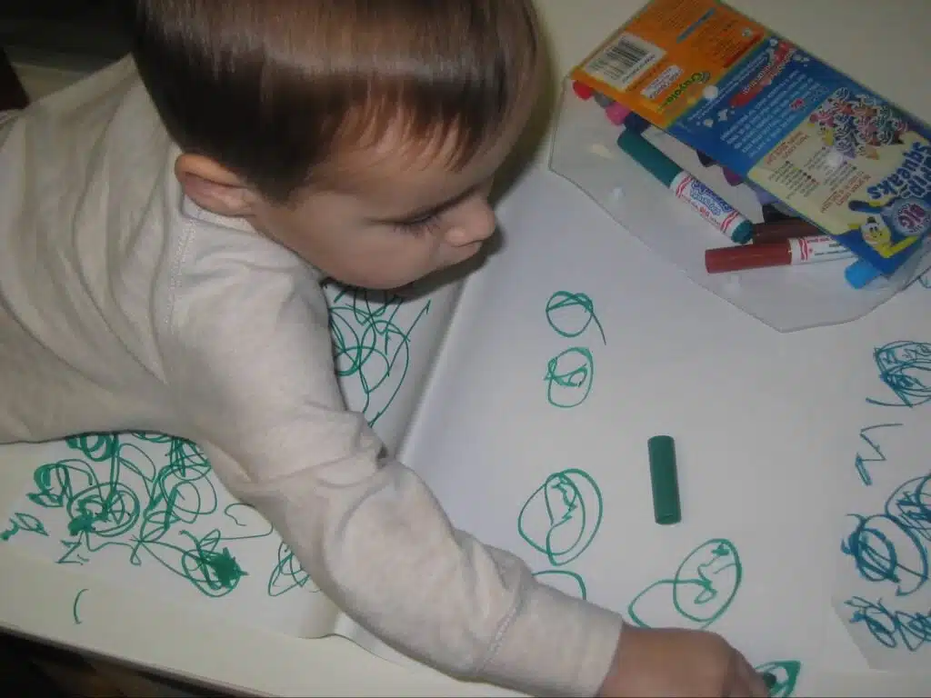 Toddler drawing with marker