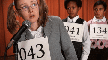 Spelling Bee Image Of Girl At Mic