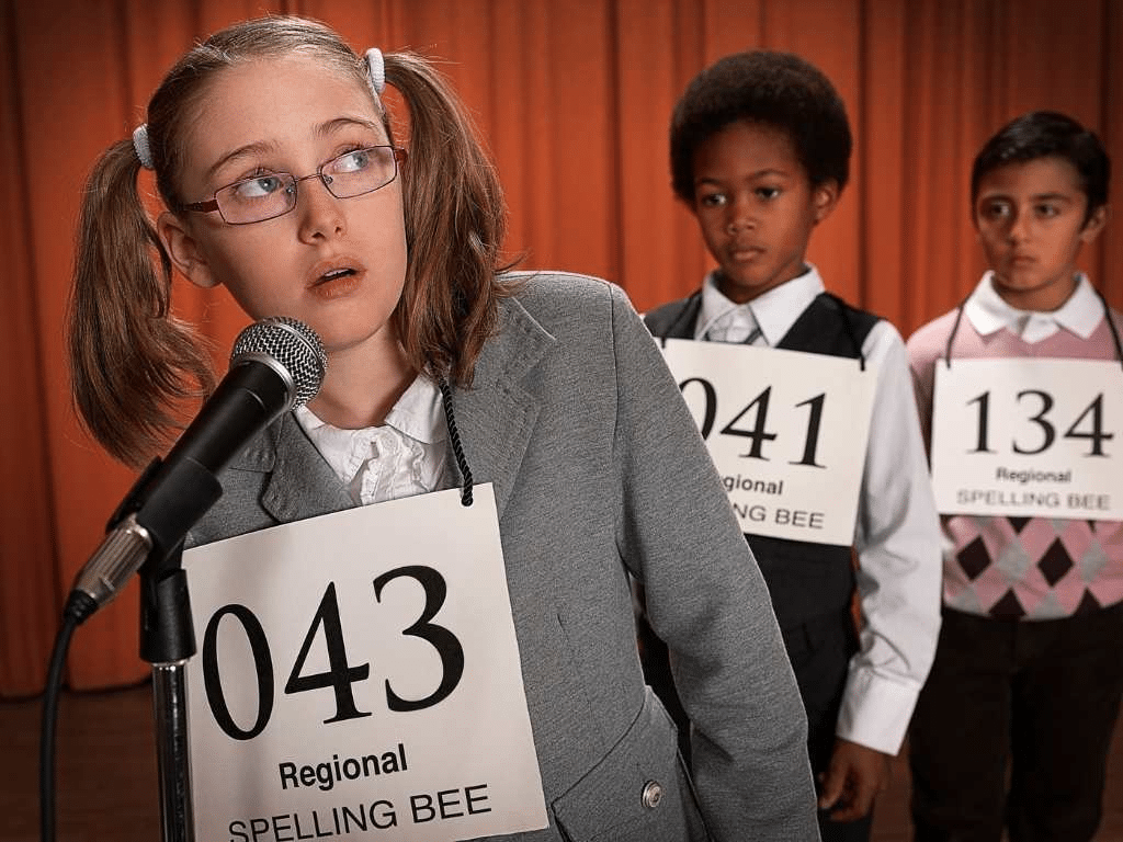 Spelling Bee Image Of Girl At Mic